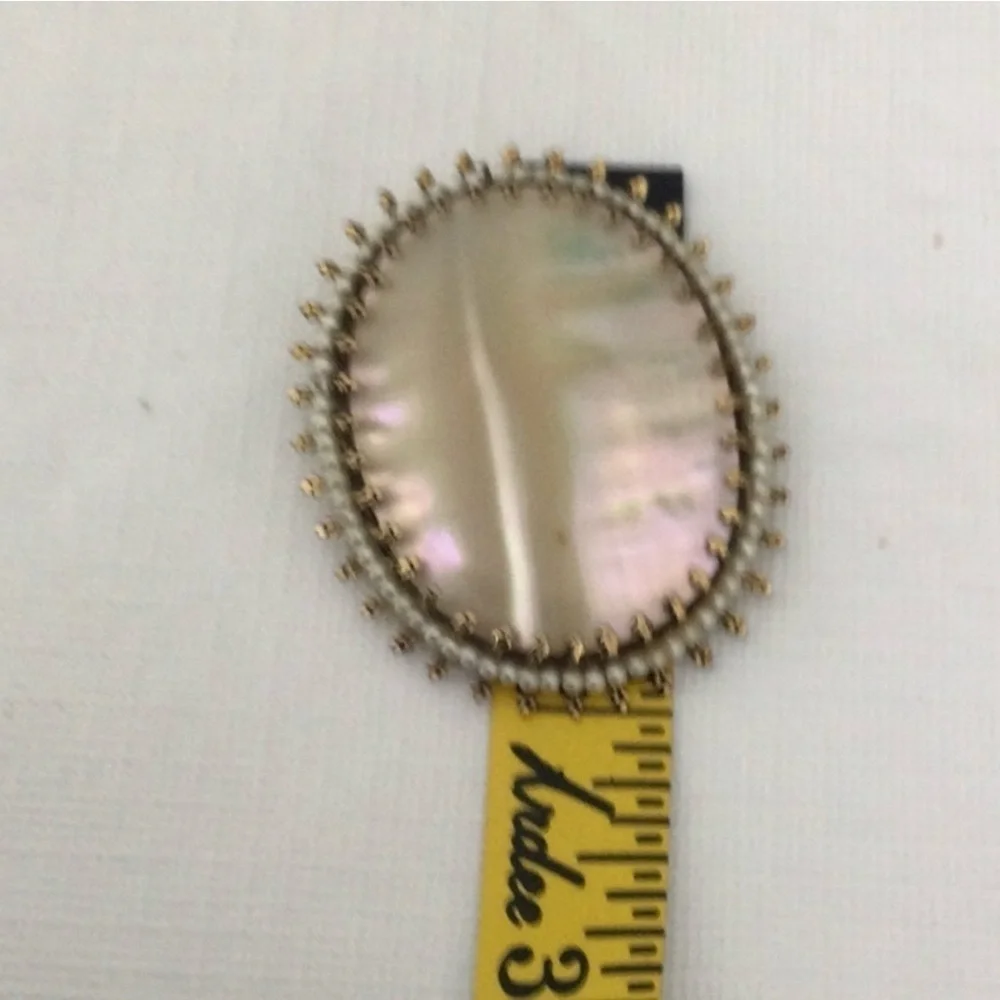 Woman’s Vintage Abalone Shell Brooch with pearls can also be worn on a chain.